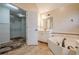 Ensuite bathroom boasting a bathtub, lots of space, and direct access to the main bedroom walk-in closet at 425 Fieldstone Lndg, Alpharetta, GA 30005