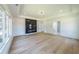 Large bedroom featuring a modern fireplace and an abundance of natural light at 972 Auburn Rd, Dacula, GA 30019
