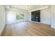 Bedroom featuring fireplace and natural light from multiple windows at 972 Auburn Rd, Dacula, GA 30019