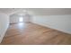 Spacious bonus room with hardwood floors and bright natural light at 972 Auburn Rd, Dacula, GA 30019