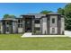 Striking new two-story home boasting a black and white brick facade and manicured lawn at 972 Auburn Rd, Dacula, GA 30019