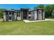 Stunning two-story home featuring modern architectural details, well-kept lawn, and professional landscaping at 972 Auburn Rd, Dacula, GA 30019