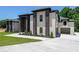 Beautiful home with a side-entry garage, manicured landscaping, and a modern brick design at 972 Auburn Rd, Dacula, GA 30019