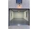 Clean, bright garage with epoxy flooring and modern lighting at 972 Auburn Rd, Dacula, GA 30019