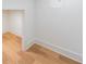Hallway with luxury vinyl floors, leading to other areas of the home, is a blank canvas awaiting personalization at 972 Auburn Rd, Dacula, GA 30019