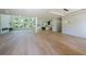 Open-concept living room showcasing hardwood floors, ample natural light, and modern finishes at 972 Auburn Rd, Dacula, GA 30019