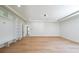 Bright, spacious living room with hardwood floors and custom shelving, perfect for entertaining at 972 Auburn Rd, Dacula, GA 30019