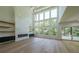Bright living room with high ceilings and large windows offering an abundance of natural light at 972 Auburn Rd, Dacula, GA 30019
