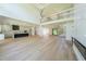 Open floor plan connecting kitchen and living area with soaring ceilings at 972 Auburn Rd, Dacula, GA 30019