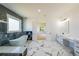 Luxurious bathroom featuring marble floors, soaking tub, and modern vanities at 972 Auburn Rd, Dacula, GA 30019