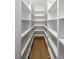Walk-in pantry with floor to ceiling shelving at 972 Auburn Rd, Dacula, GA 30019