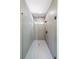 Modern, glass-enclosed shower stall with gray tile and mosaic floor at 972 Auburn Rd, Dacula, GA 30019