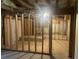 Unfinished basement with exposed framing, offering potential for customization at 1075 Crystal Water Dr, Lawrenceville, GA 30045
