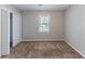 Bedroom with closet and window that provides natural light at 1296 Carman Se Ct, Conyers, GA 30013