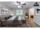 This virtually staged bedroom includes a neutral pallet, carpet, and a connecting bath at 1296 Carman Se Ct, Conyers, GA 30013