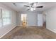 Spacious bedroom featuring neutral paint, carpet flooring and natural light at 1296 Carman Se Ct, Conyers, GA 30013