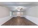 Living room with wainscotting and wood flooring at 1296 Carman Se Ct, Conyers, GA 30013