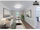 Virtually staged living room with modern furniture and decor at 1296 Carman Se Ct, Conyers, GA 30013