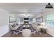 Staged living room with fireplace and built-in bookshelves at 1296 Carman Se Ct, Conyers, GA 30013