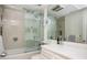 Bright bathroom with a glass-enclosed shower, sleek fixtures, and marble countertops at 145 15Th Ne St # 1225, Atlanta, GA 30309