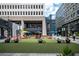 Welcoming community space with comfortable seating, lush green areas, and vibrant umbrellas for residents at 145 15Th Ne St # 1225, Atlanta, GA 30309