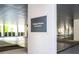 A sophisticated condo entrance with a water feature and modern architectural details at 145 15Th Ne St # 1225, Atlanta, GA 30309