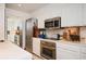 Bright kitchen features stainless steel appliances, modern backsplash, and ample counter space at 145 15Th Ne St # 1225, Atlanta, GA 30309