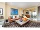 Stylish living area featuring a contemporary design, with natural light and a view of the dining room at 145 15Th Ne St # 1225, Atlanta, GA 30309