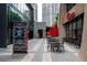 Pleasant outdoor seating area with tables and chairs, perfect for enjoying a meal in a vibrant urban setting at 145 15Th Ne St # 1225, Atlanta, GA 30309