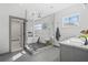 Modern bathroom with glass shower, soaking tub, and double sink vanity at 3378 Bachelor St, Atlanta, GA 30344