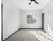 Bright bedroom featuring ceiling fan, recessed lights, and large windows at 3378 Bachelor St, Atlanta, GA 30344