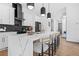 Modern kitchen with stainless appliances, granite countertops, and center island with seating at 3378 Bachelor St, Atlanta, GA 30344