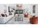 Modern living room featuring a linear fireplace, neutral decor, and an open layout perfect for entertaining at 3378 Bachelor St, Atlanta, GA 30344