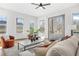 Inviting living room features ample natural light, modern furnishings, and hardwood floors throughout at 3378 Bachelor St, Atlanta, GA 30344