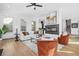 Bright living room boasts a modern fireplace, hardwood floors, and stylish decor for comfortable living at 3378 Bachelor St, Atlanta, GA 30344