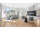 Open concept living space features a dining area with fireplace, seamlessly blending style and function at 3378 Bachelor St, Atlanta, GA 30344