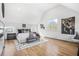 Bright and spacious main bedroom with hardwood floors, ensuite bathroom and vaulted ceilings at 3378 Bachelor St, Atlanta, GA 30344