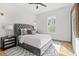 Comfortable main bedroom boasts a large bed, side tables, and recessed lighting at 3378 Bachelor St, Atlanta, GA 30344