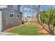 View of the property's landscaped side yard offering outdoor space and mature shrubbery at 3378 Bachelor St, Atlanta, GA 30344