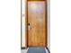 Modern apartment door with minimalist design, wood finish, and contemporary hardware at 650 Glen Iris Drive Ne # 27, Atlanta, GA 30308