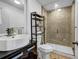 Sleek bathroom with glass shower, mosaic tile, modern vanity, and contemporary fixtures at 650 Glen Iris Drive Ne # 27, Atlanta, GA 30308