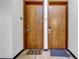Hallway with apartment doors, apartment numbers, and door mats outside each unit at 650 Glen Iris Drive Ne # 27, Atlanta, GA 30308