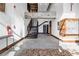 Bright welcoming lobby with stairs leading to upper levels, mailboxes, and fire extinguisher at 650 Glen Iris Drive Ne # 27, Atlanta, GA 30308