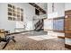 Welcoming lobby with mailboxes, chairs, mosaic flooring, and modern design stairs leading to upper levels at 650 Glen Iris Drive Ne # 27, Atlanta, GA 30308