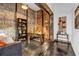 Open office space with exposed brick, concrete floors, and modern desk at 650 Glen Iris Drive Ne # 27, Atlanta, GA 30308