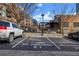 Close up on parking showing reserved spaces at Glen Iris Lofts at 650 Glen Iris Drive Ne # 27, Atlanta, GA 30308
