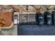 Aerial view of parking spaces with visible painted parking spot numbers and trees surrounding lot at 650 Glen Iris Drive Ne # 27, Atlanta, GA 30308