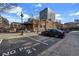 Parking lot view with reserved spaces adjacent to Glen Iris Lofts at 650 Glen Iris Drive Ne # 27, Atlanta, GA 30308