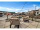 Comfortable rooftop deck lounge area with patio furniture and string lights at 650 Glen Iris Drive Ne # 27, Atlanta, GA 30308