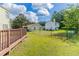 Backyard featuring wood deck and large grassy area at 7623 Mcgillicuty Dr, Union City, GA 30291